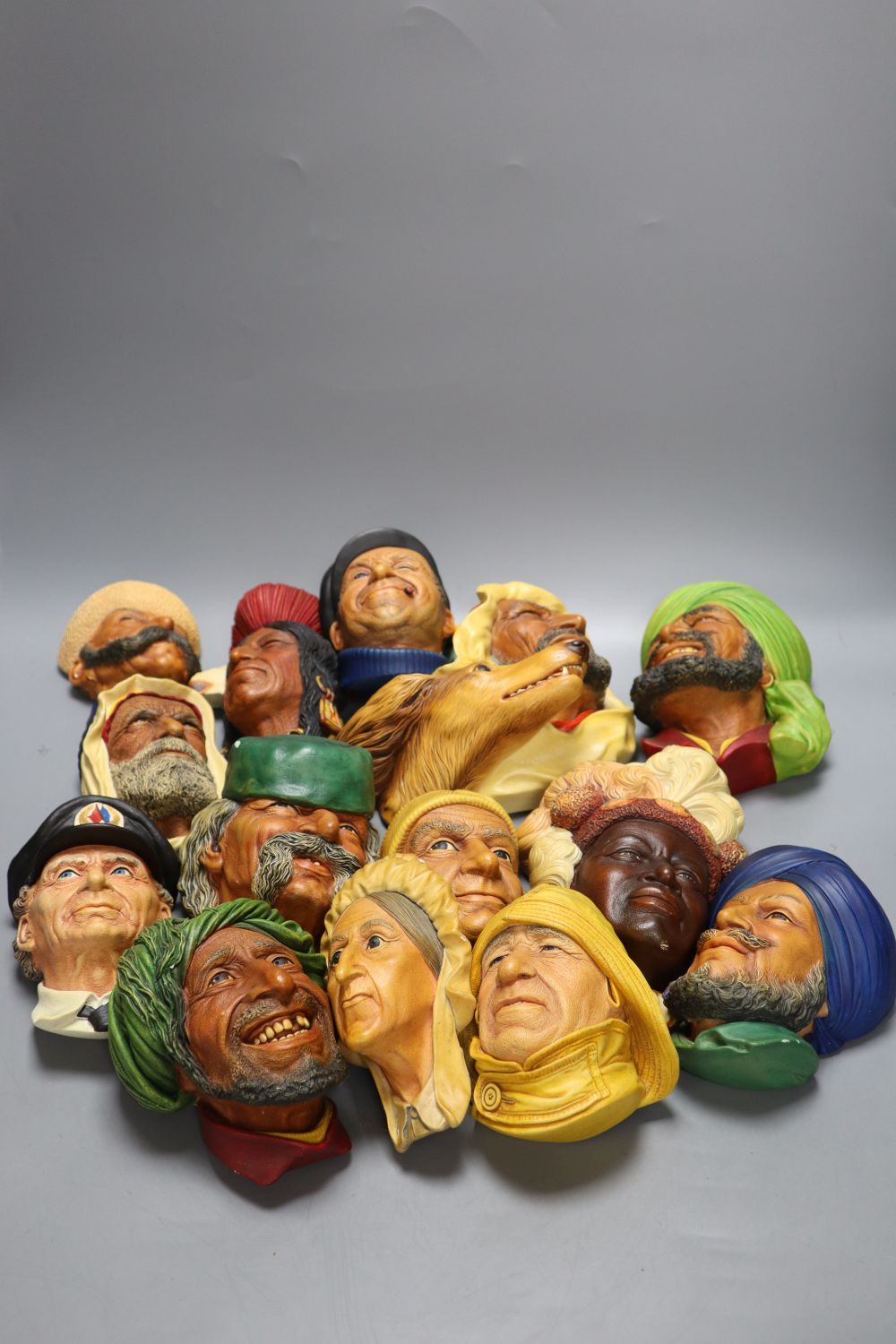 Fourteen Bossons painted plaster portrait wall plaques